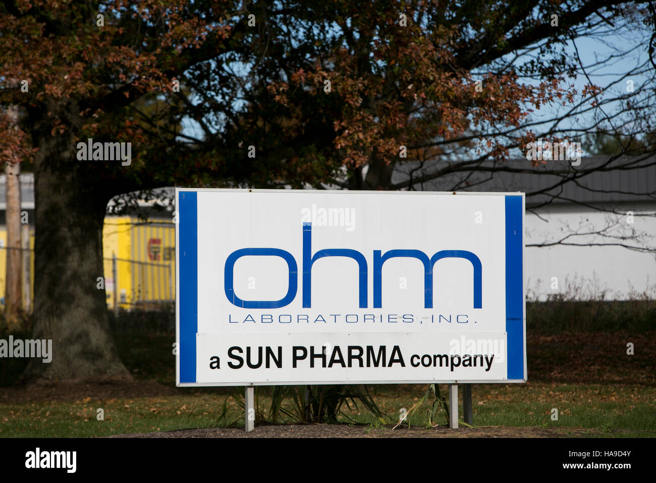 A logo sign outside of a facility occupied by the Ohm Laboratories in