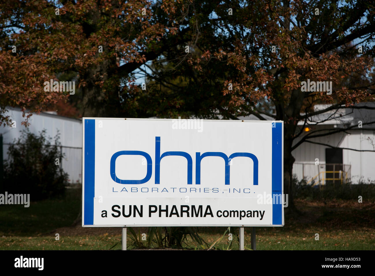 A logo sign outside of a facility occupied by the Ohm Laboratories in