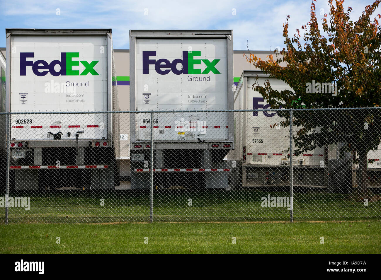 FedEx Ground logos on truck trailers lined up at a facility in Dayton