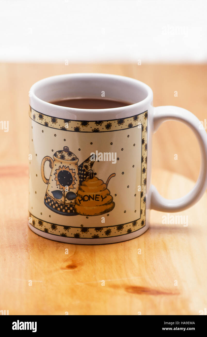 Coffee mug on wooden table Stock Photo