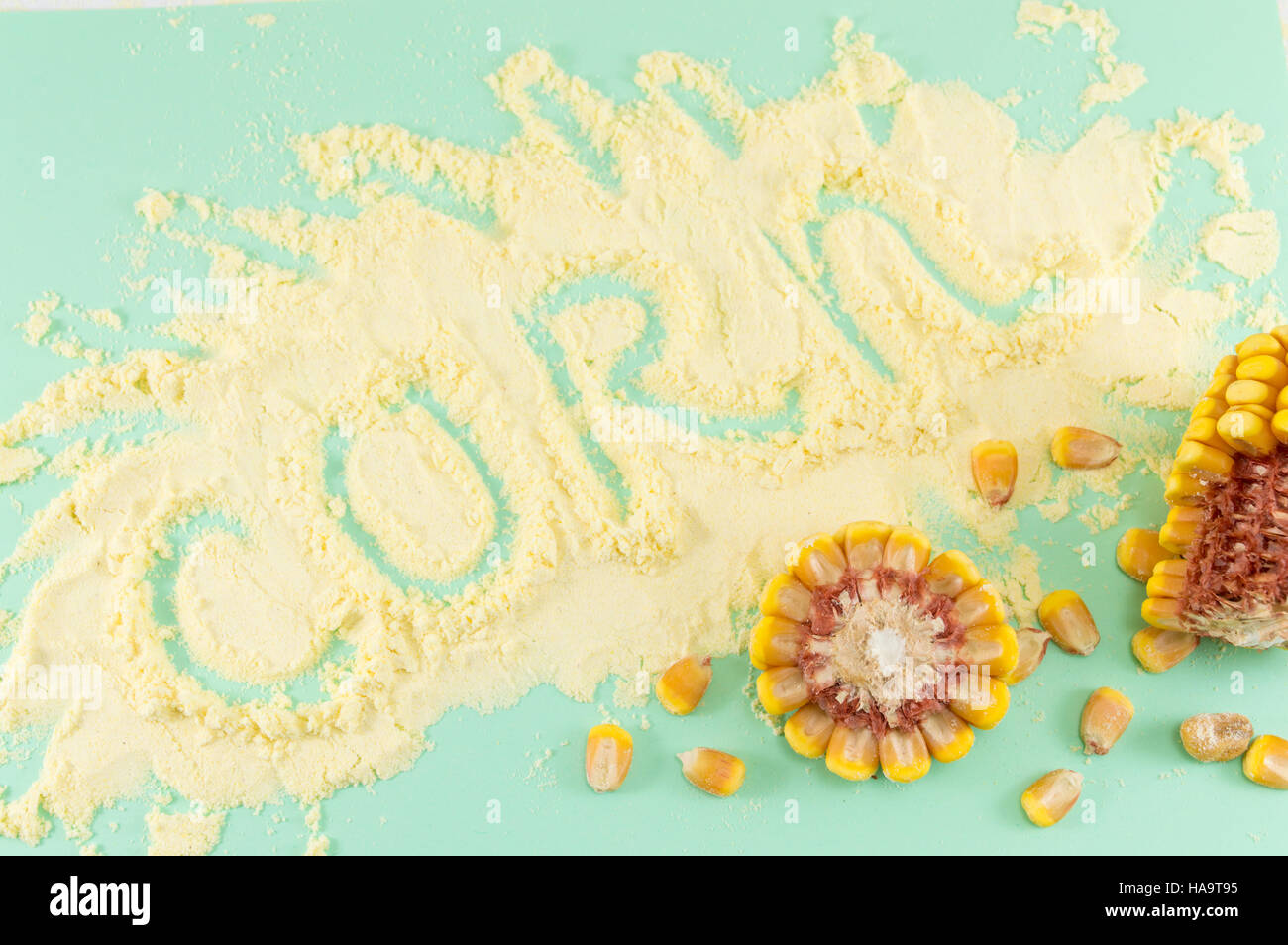 corn flour with the word corn written in it with corn cobs Stock Photo