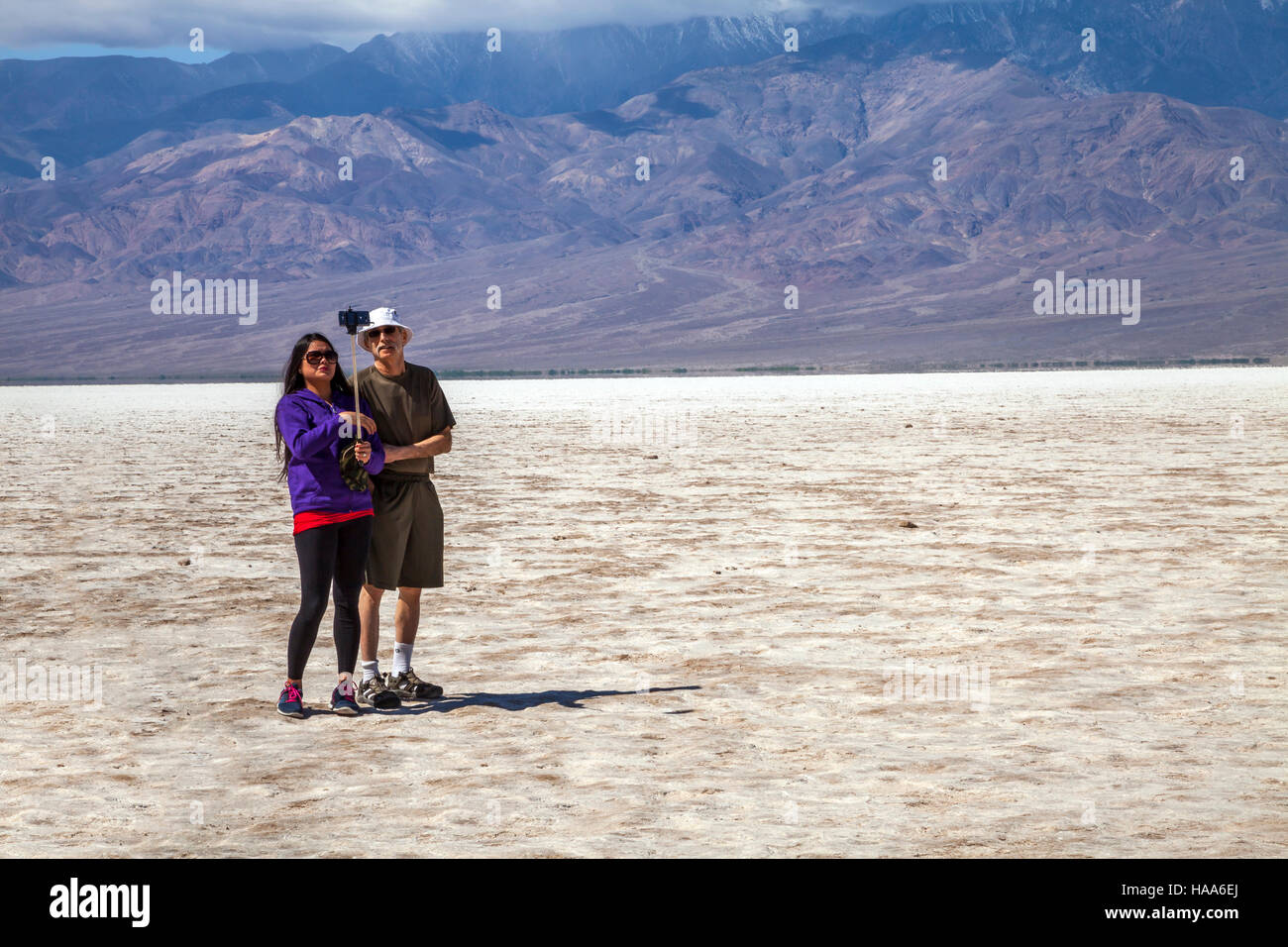 Couple taking selfie, Badwater Basin, Death Valley National Park, California, USA Stock Photo