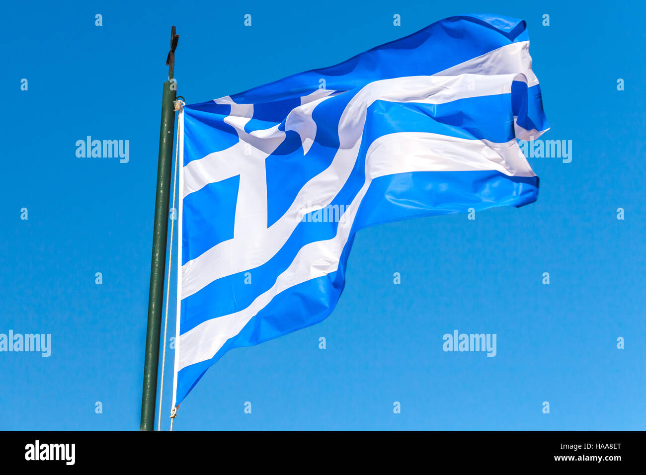 Flag of Greece wavin gover blue sky background Stock Photo