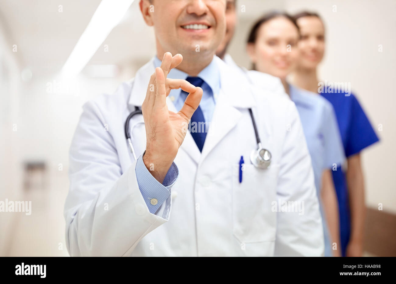 close up of doctors at hospital showing ok sign Stock Photo Alamy