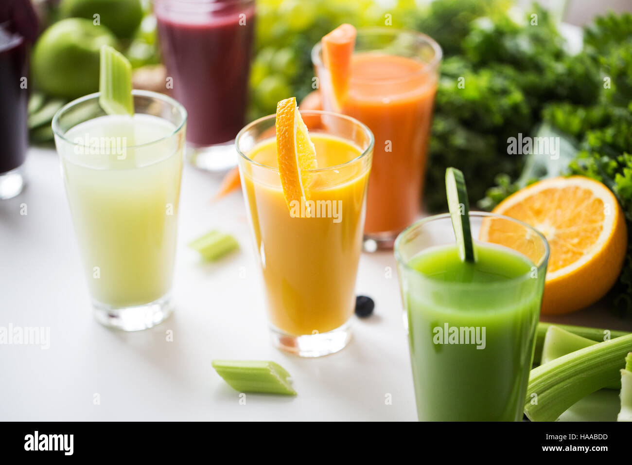 glasses with different fruit or vegetable juices Stock Photo Alamy