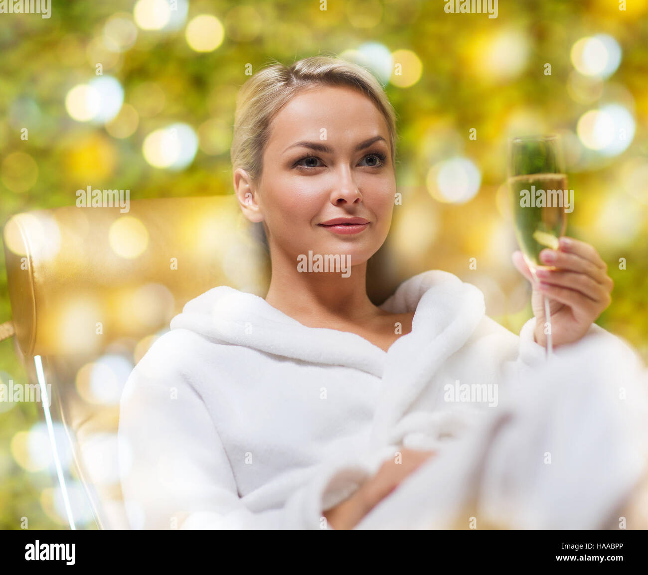 beautiful young woman drinking champagne at spa Stock Photo Alamy