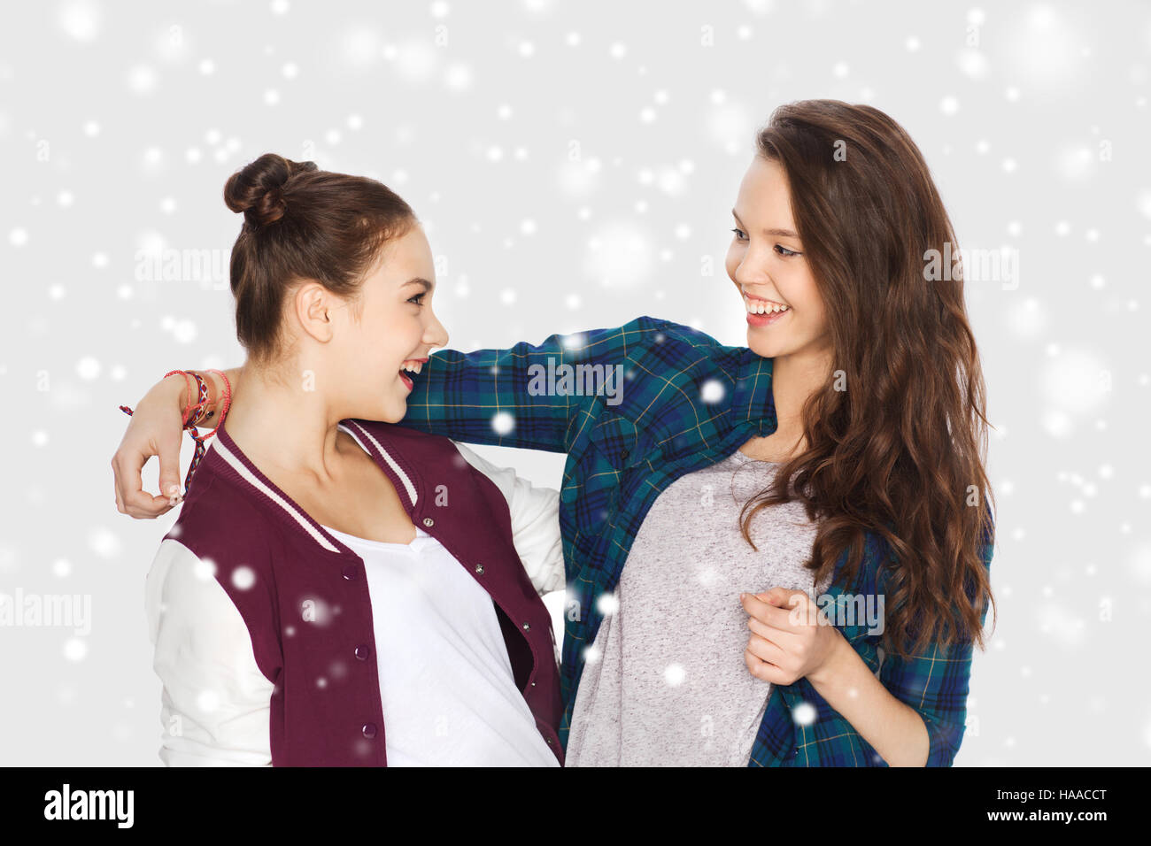 happy smiling pretty teenage girls hugging Stock Photo - Alamy