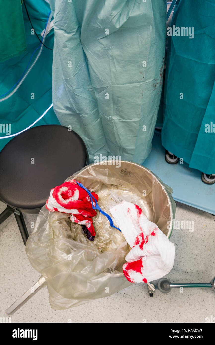 Blood on surgical sponges. Heart valve replacement surgery, operating room, Reykjavik, Iceland. Stock Photo