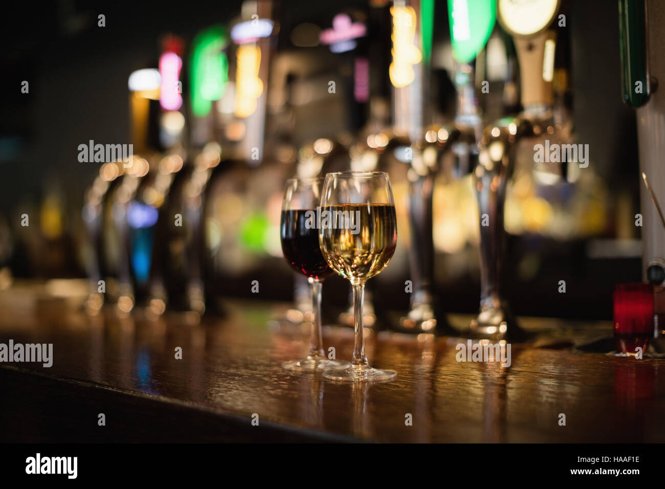 Two glass of red wine on bar counter Stock Photo
