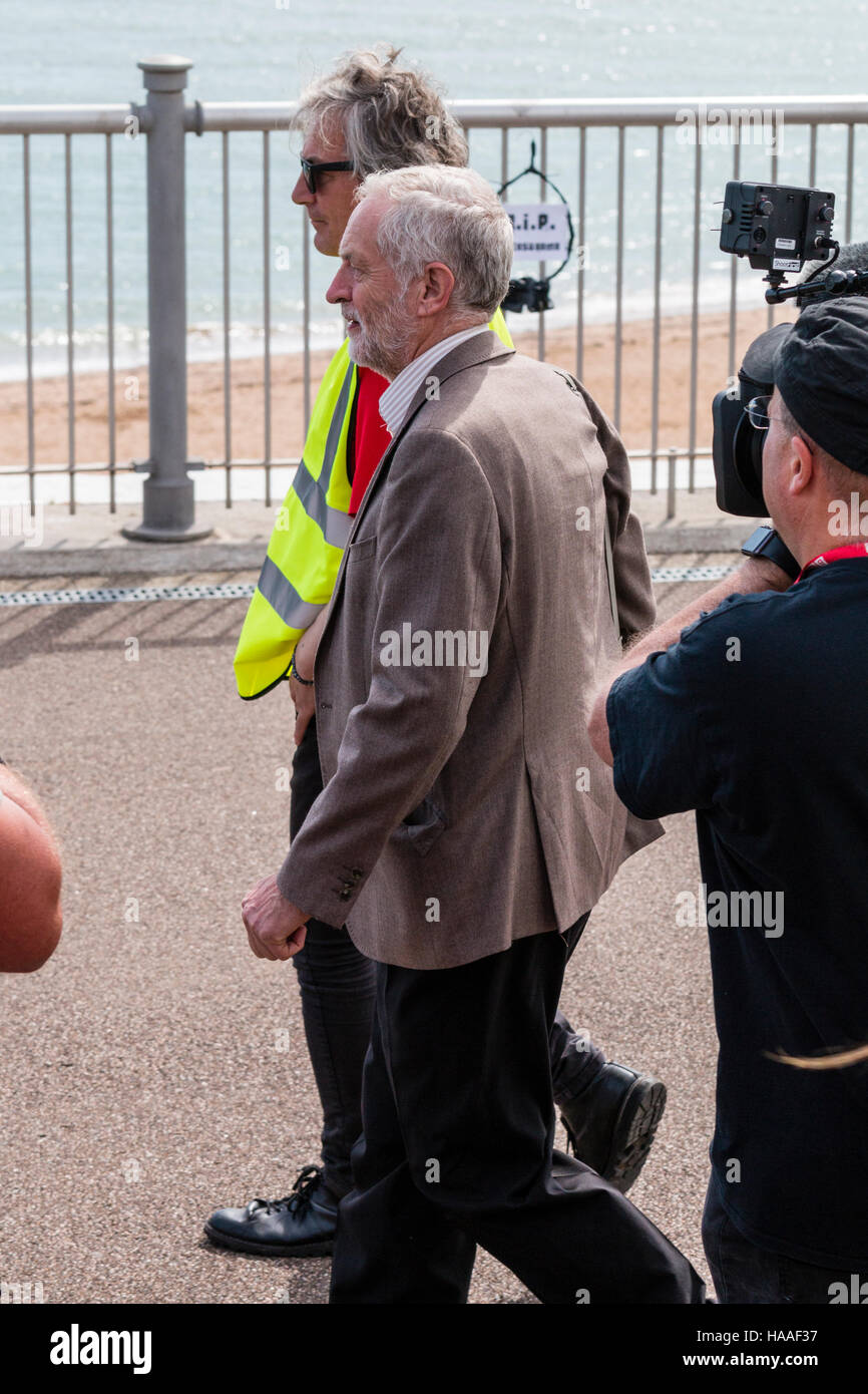 Jeremy Corbyn rally. Jeremy walking along the seafront promenade at Ramsgate with minders around him and press taking pictures. Stock Photo