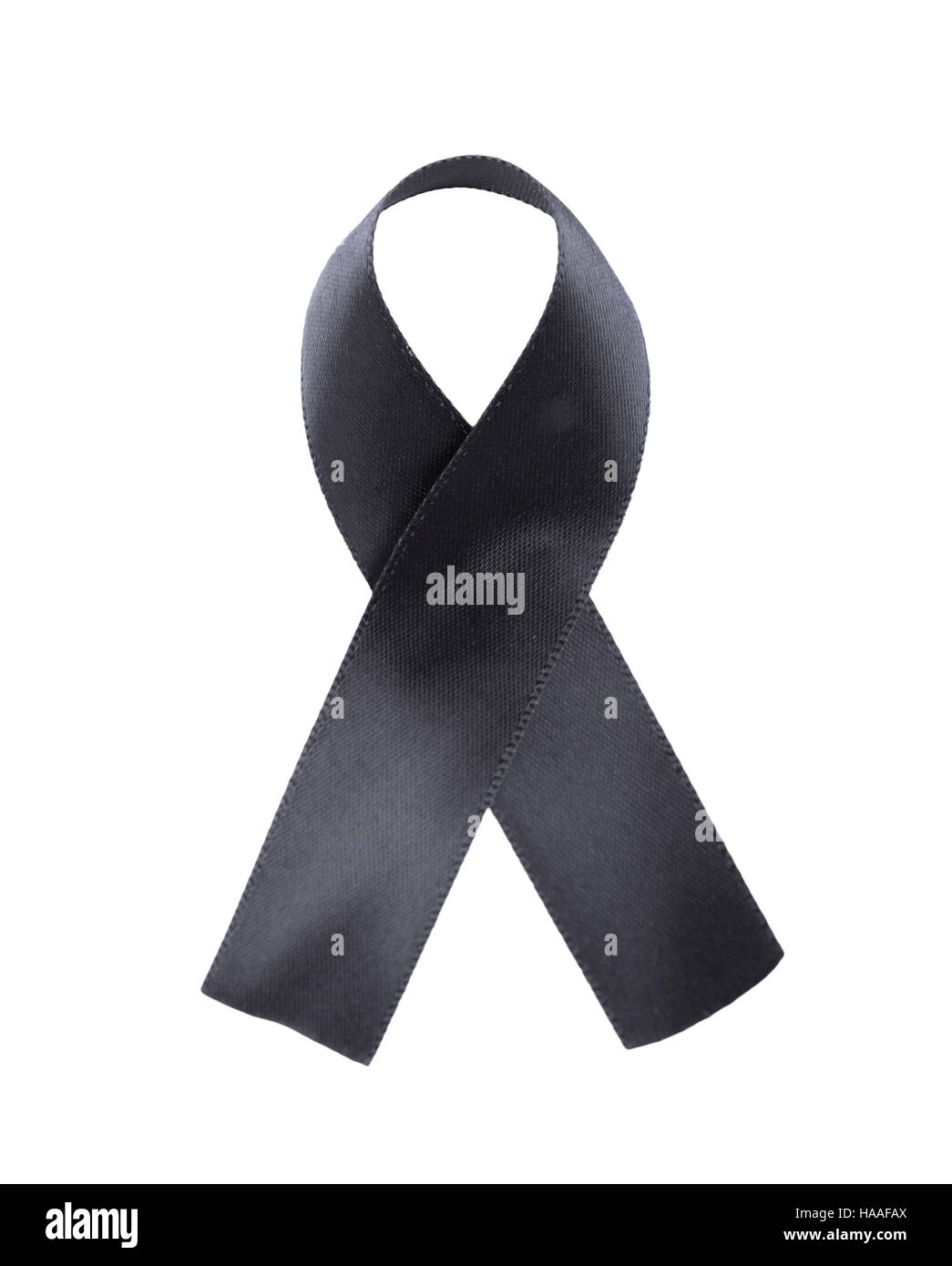 Black ribbon isolated on white background, mourning and melanoma sign Stock Photo