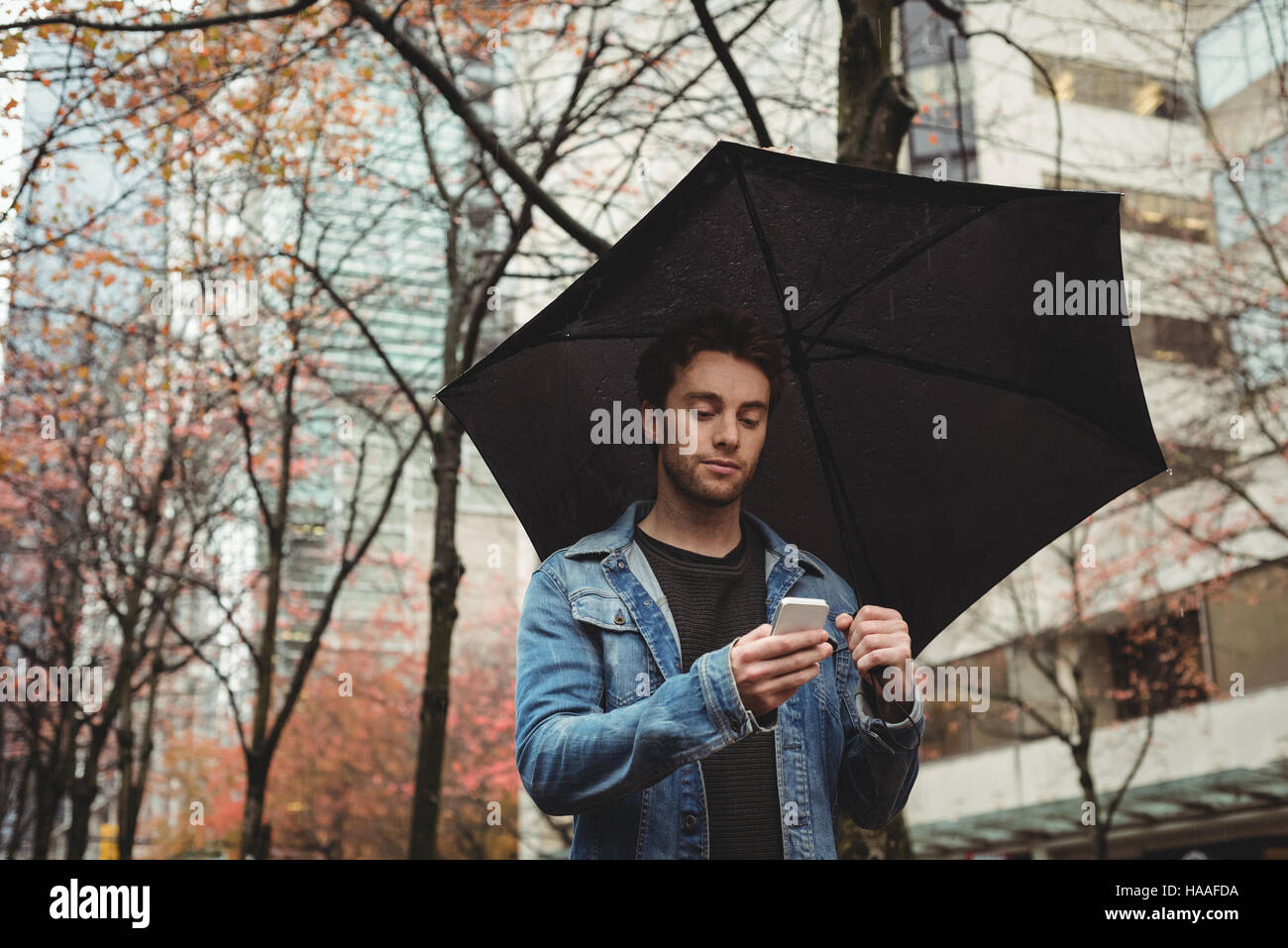 Using umbrella hi-res stock photography and images - Alamy