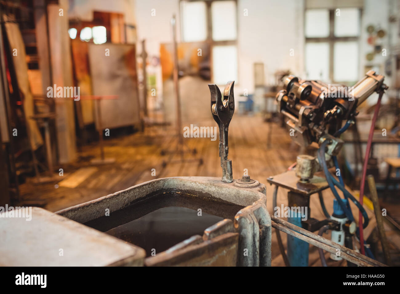 Empty workstation at glassblowing factory Stock Photo