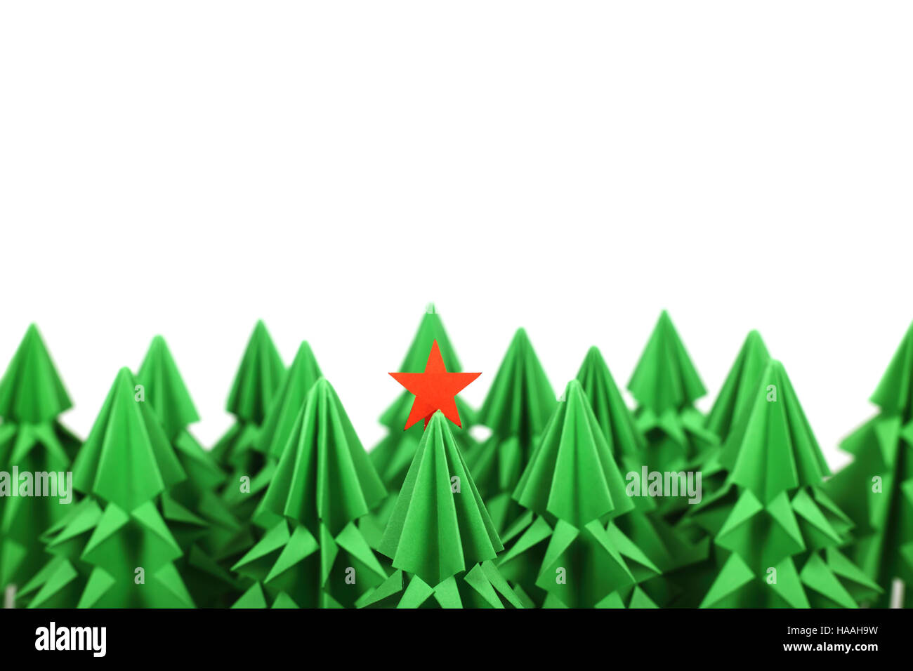 Green origami christmas trees isolated on white background Stock Photo ...