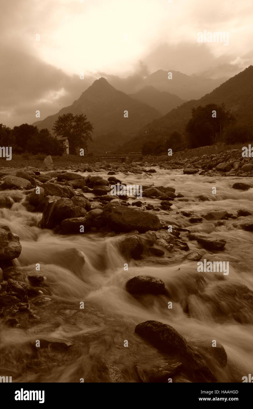 Rushing river in Italian Alps Stock Photo