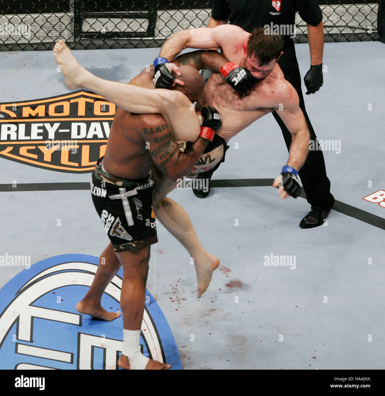 Forrest Griffin (tan shorts) fights Quinton Jackson (black shorts