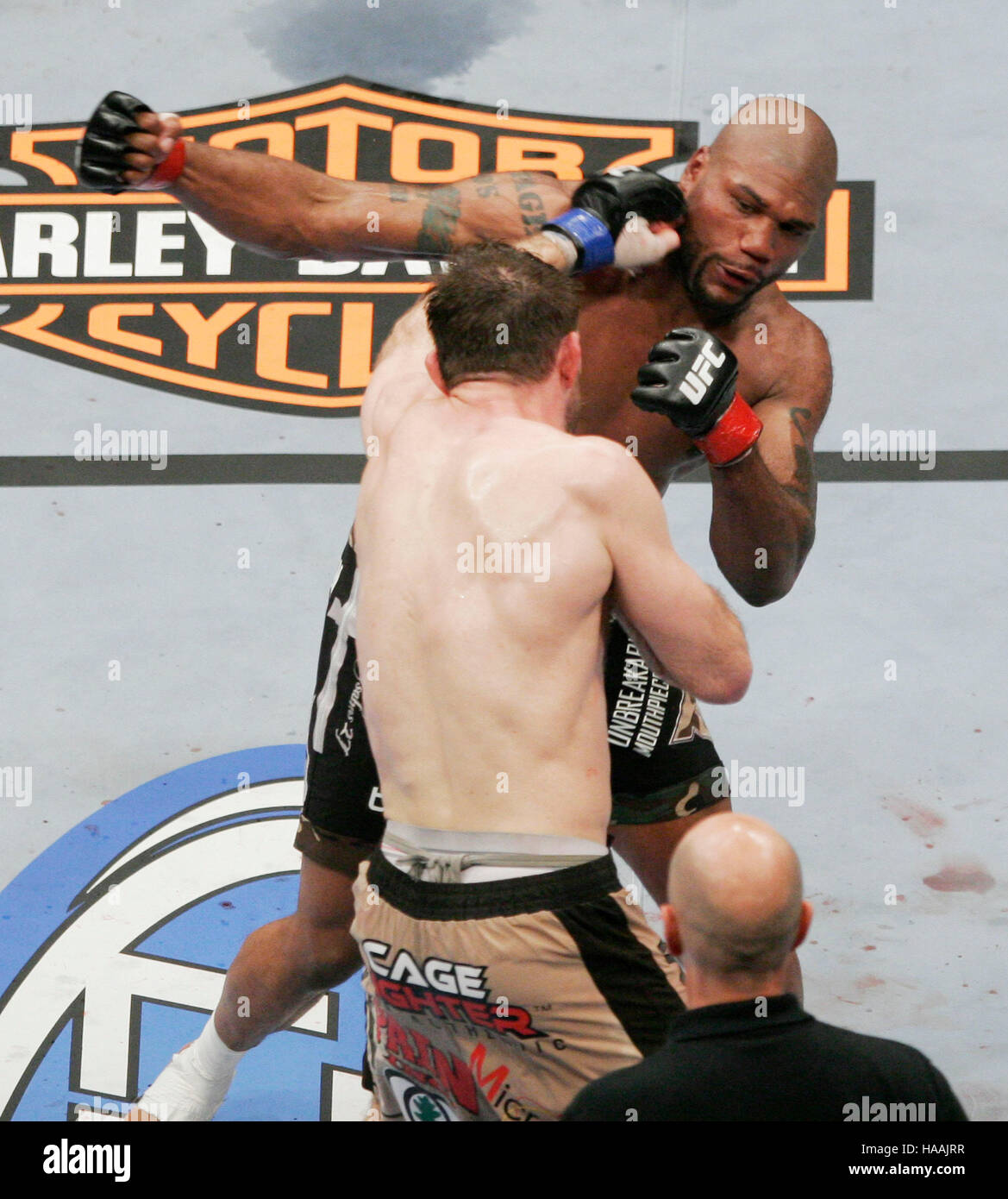 Forrest Griffin (tan shorts) fights Quinton Jackson (black shorts