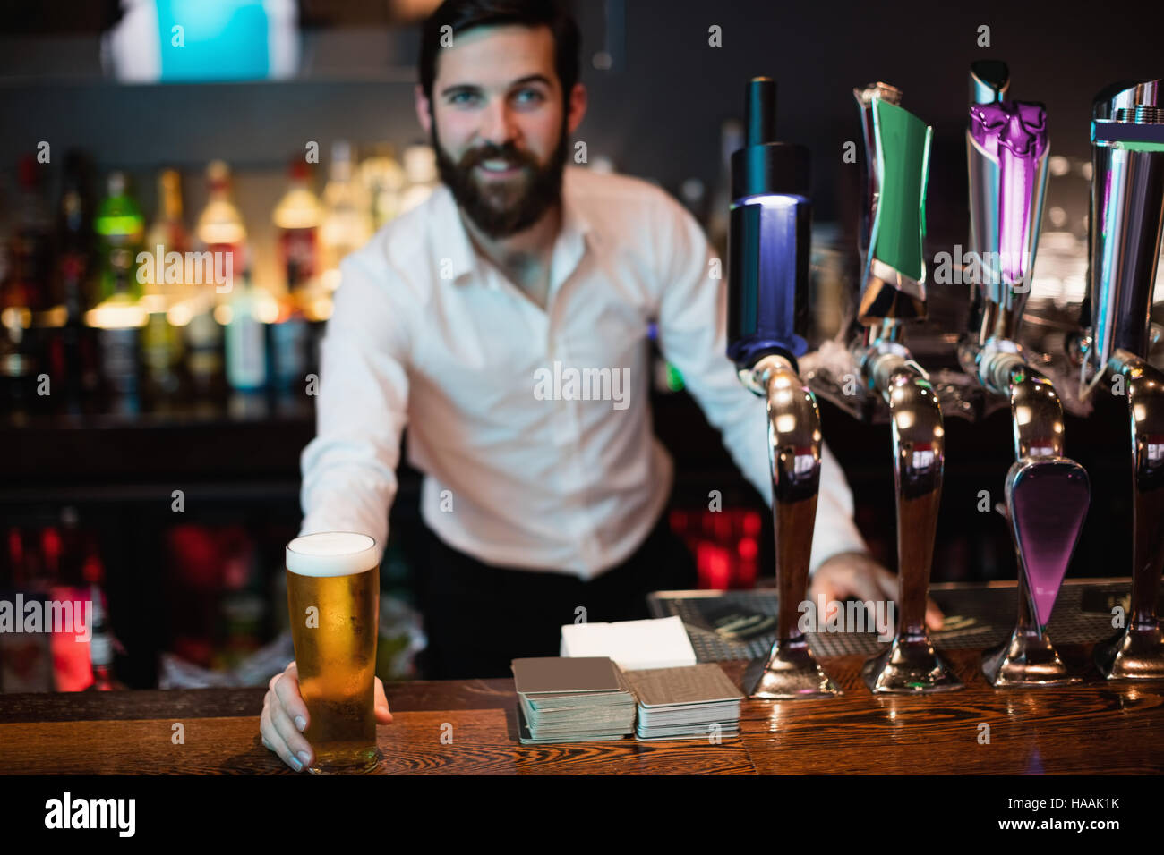Holding beer hi-res stock photography and images - Alamy