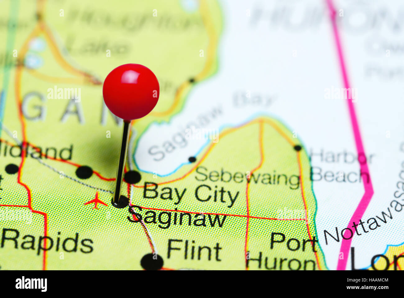 Saginaw pinned on a map of Michigan, USA Stock Photo