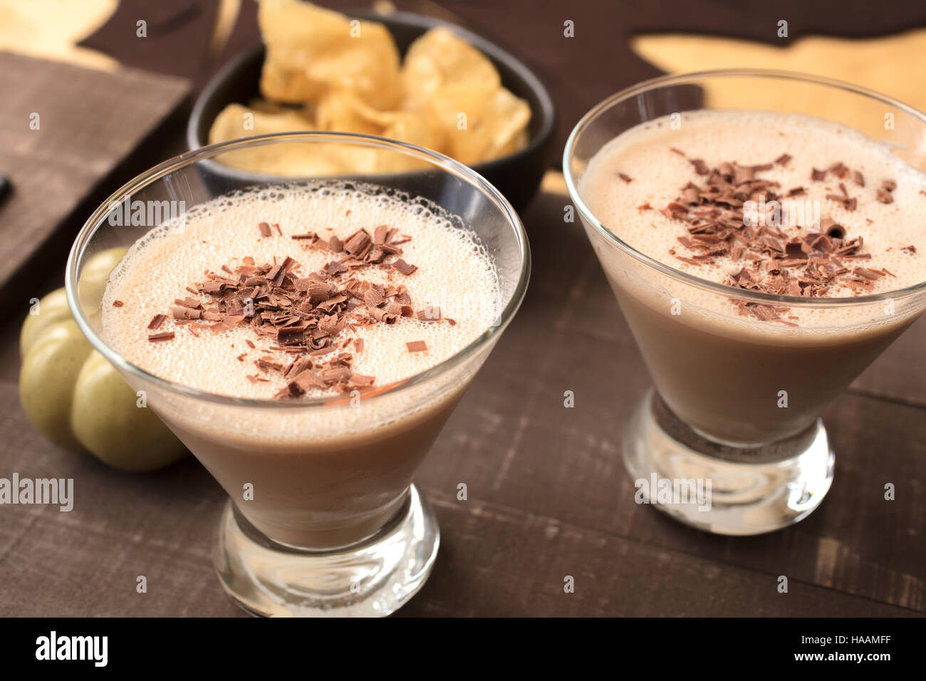 Two glasses filled with a milk, amaretto, hazelnut liqueur drink for a