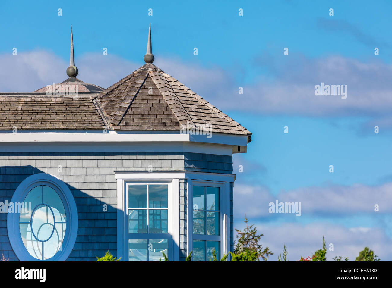 detail of a house with sky and clouds in the Hamptons Stock Photo