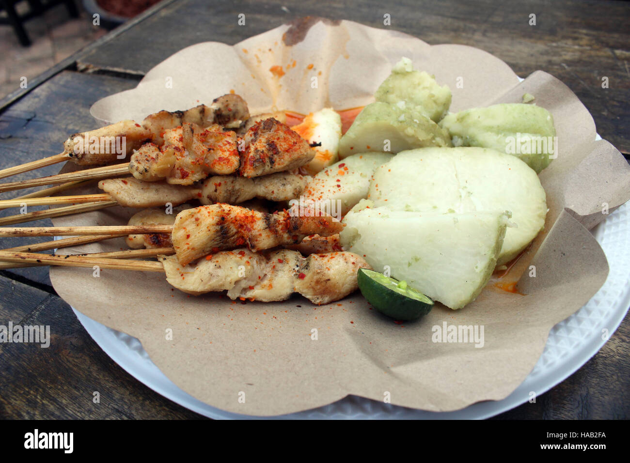 Traditional Indonesian chicken sate taican snacks fast food roasted chilli sauce Stock Photo