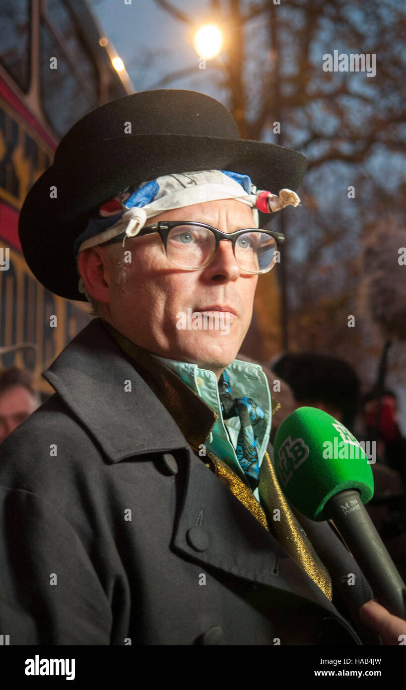 Joe Corre (son of the fashion designer Vivienne Westwood and Malcolm Mclaren) speaks to the press after burning his £5 million pound collection of punk memorabilia in protest to declare 'punk is dead'. The burning took place on a barge on Chelsea Embankment. Stock Photo