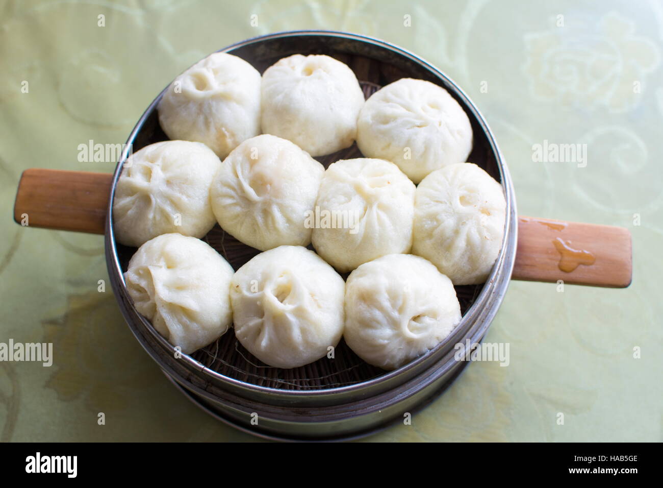 Steamed Chinese Meat Buns Baozi in a bowl Stock Photo