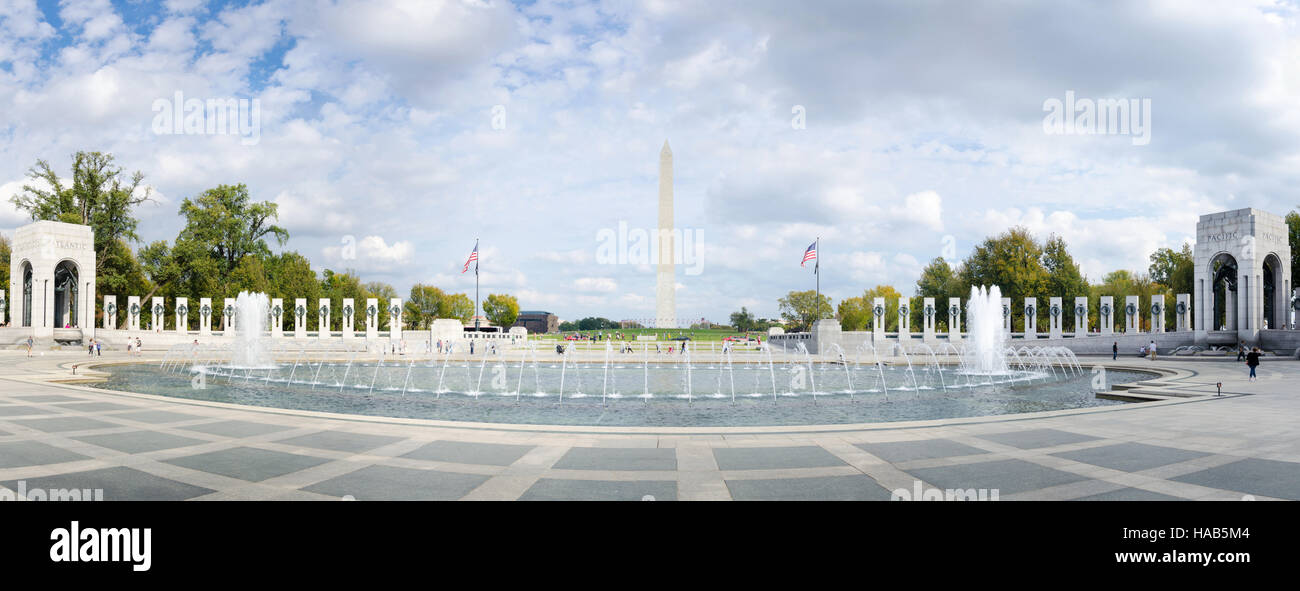WASHINGTON DC, USA - OCTOBER 20, 2016: World War II memorial monument with fountain full view panorama with few tourist passing buy Stock Photo
