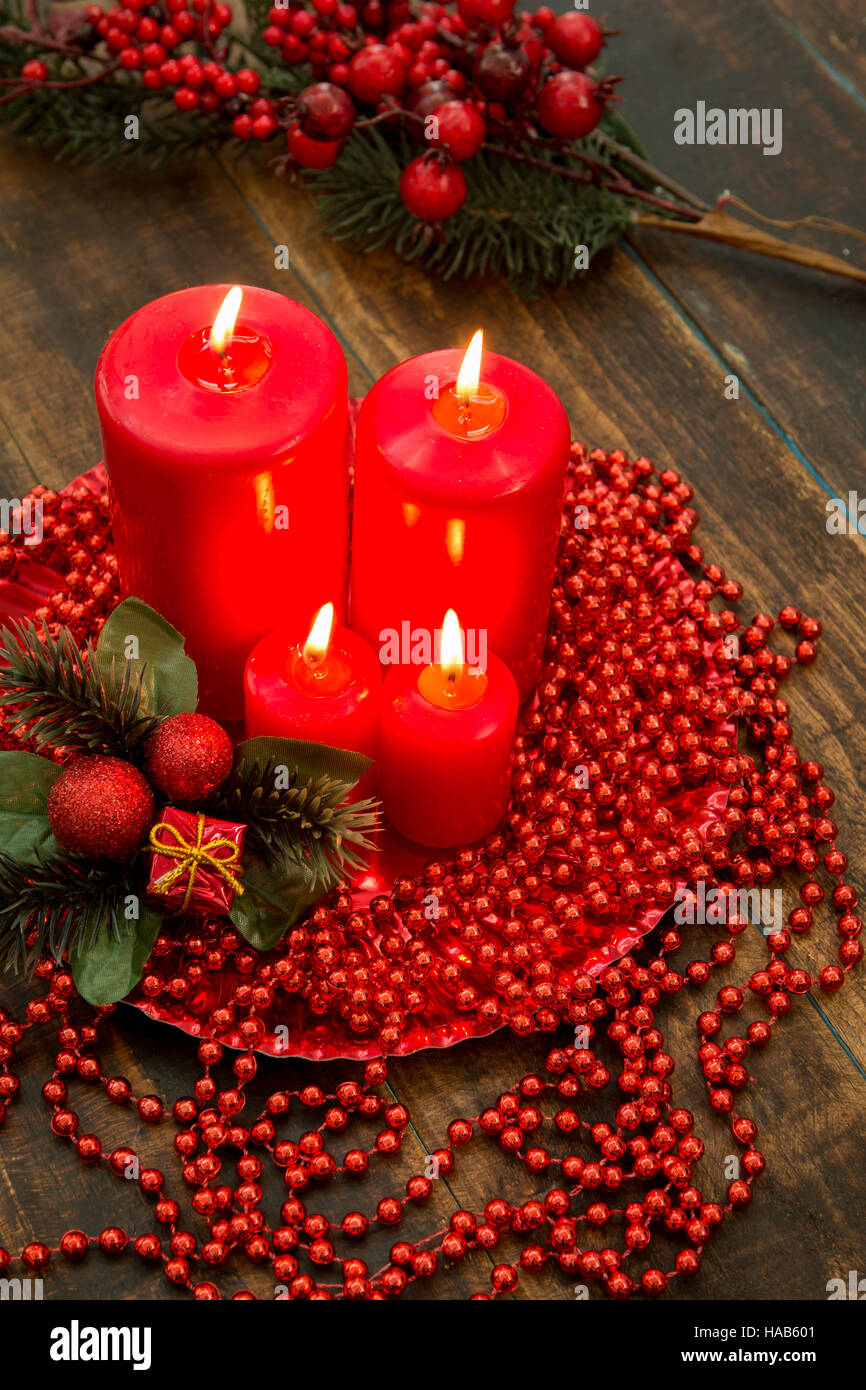 Red candles for Christmas with a beautiful decoration Stock Photo Alamy