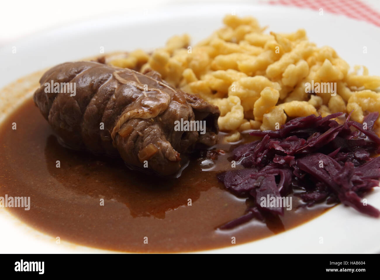 Rouladen mit Spaetzle und Rotkraut Stock Photo