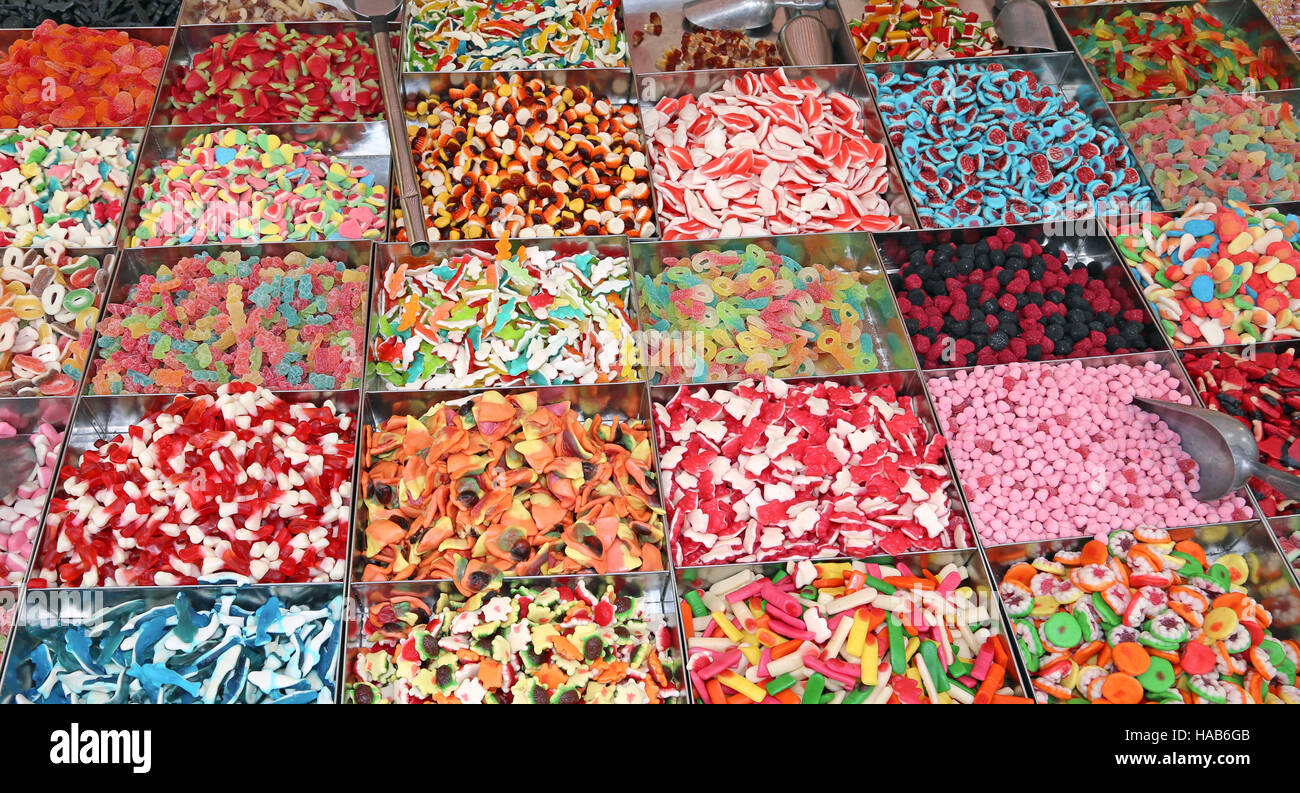 many sugary candy and chewy for sale in candy stall in the local market Stock Photo