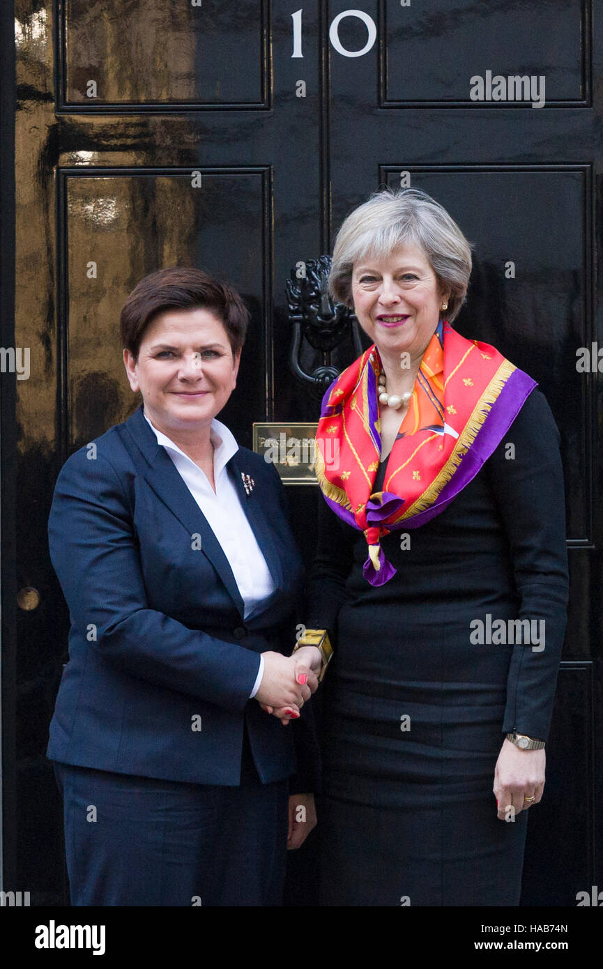 London, Britain. 28th November, 2016. Theresa May, the British Prime Minister, greeting Beata Szydło Prime Minister of Poland, as he arrives at 10 Downing Street, London.  The Prime Minsters are are holding historic bilateral summit designed to strengthen the relationship between the UK and Poland as Britain prepares to leave the EU. The summit will bring together both Prime Ministers along with a number of their senior Cabinet ministers, including the Chancellor and the Foreign and Defence Secretaries, for the first meeting of it’s kind. Credit:  Alex MacNaughton/Alamy Live News Stock Photo