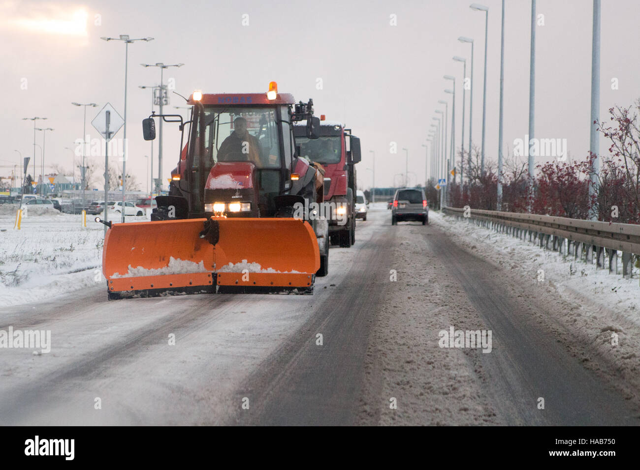 Gdansk, Poland 28 November 2016  Snow plow at making his way by the snow is seen. Heavy snowfall hits Gdansk and all northern Poland. Meteorologists predict snowfall and low temperatures during the next few days. Credit:  Michal Fludra/Alamy Live News Stock Photo