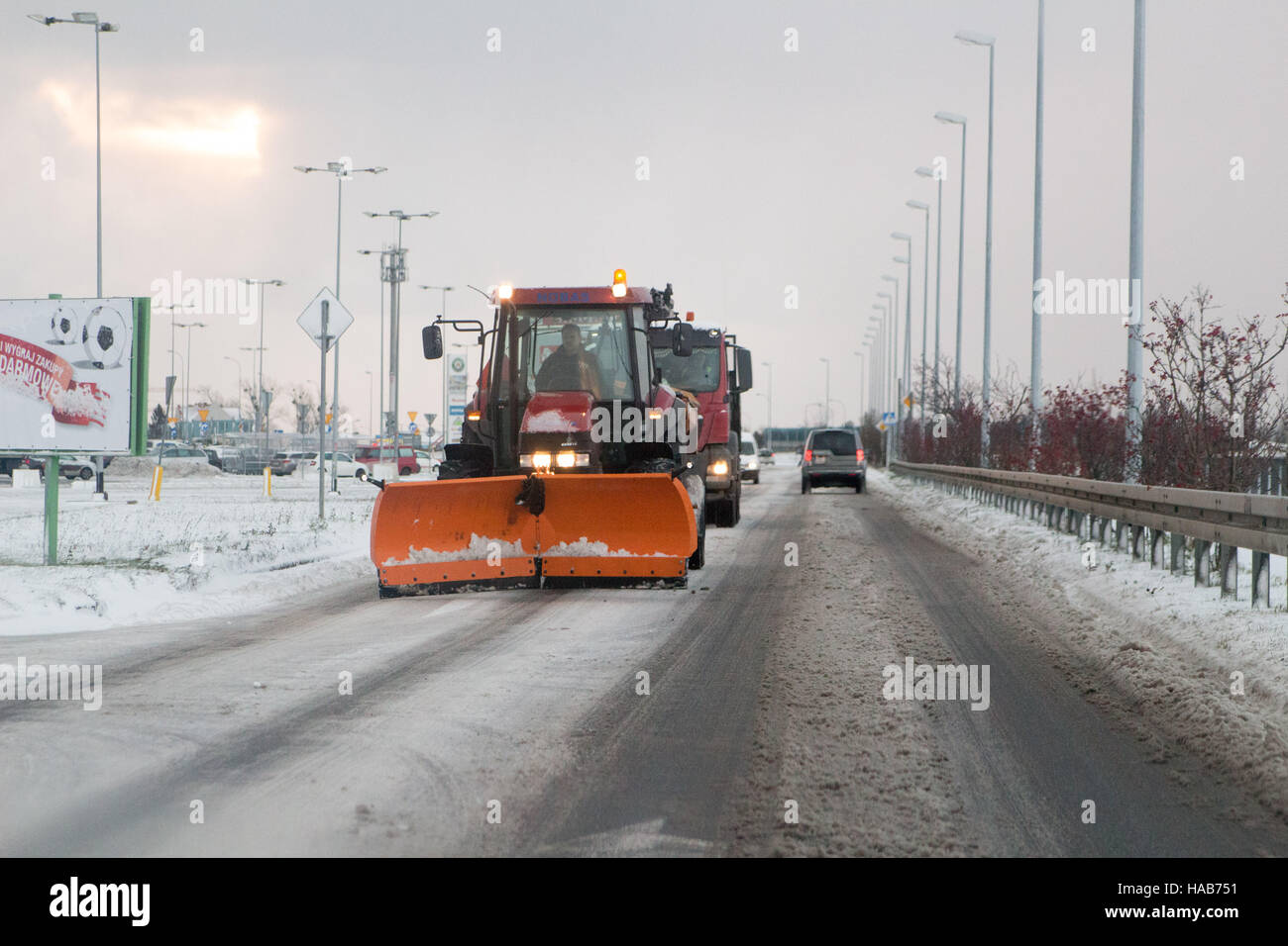 Gdansk, Poland 28 November 2016  Snow plow at making his way by the snow is seen. Heavy snowfall hits Gdansk and all northern Poland. Meteorologists predict snowfall and low temperatures during the next few days. Credit:  Michal Fludra/Alamy Live News Stock Photo