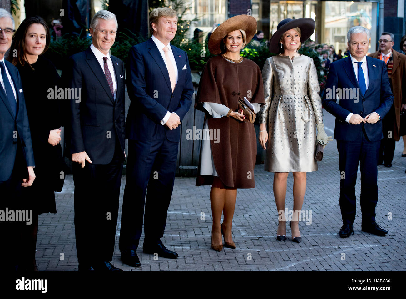 King Philippe and Queen Mathilde of Belgium and King Willem-Alexander and Queen Maxima of The Netherlands visits the Flemish culture house de Brakke Grond in Amsterdam, The Netherlands, 28 November 2016. Directer Mieke Renders guide the royal couples through the photo exhibition named Euregio-Maas-Rijn and writer Patrick Corillon introduce the show La Maison Vague to their majesties. The King and Queen of Belgium bring a 3 day state visit to the Netherlands. Photo: Patrick van Katwijk NETHERLANDS OUT POINT DE VUE OUT   - NO WIRE SERVICE - Photo: Patrick van Katwijk/Dutch Photo Press/dpa Stock Photo
