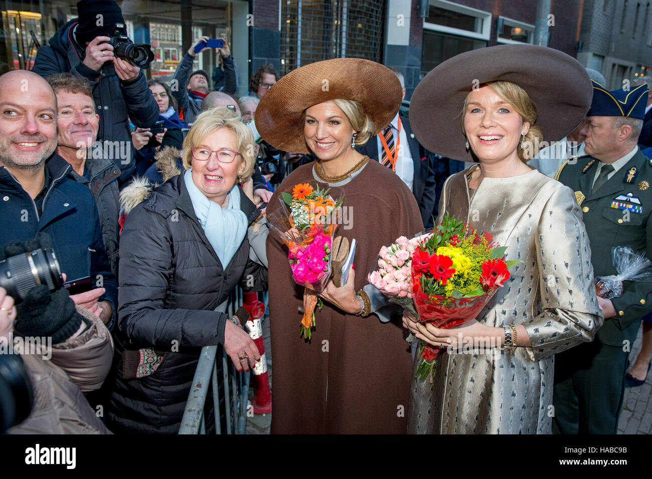 Queen Mathilde of Belgium and Queen Maxima of The Netherlands with well wishers during their visit to the Flemish culture house de Brakke Grond in Amsterdam, The Netherlands, 28 November 2016. Directer Mieke Renders guide the royal couples through the photo exhibition named Euregio-Maas-Rijn and writer Patrick Corillon introduce the show La Maison Vague to their majesties. The King and Queen of Belgium bring a 3 day state visit to the Netherlands. Photo: Patrick van Katwijk NETHERLANDS OUT POINT DE VUE OUT   - NO WIRE SERVICE - Photo: Patrick van Katwijk/Dutch Photo Press/dpa Stock Photo