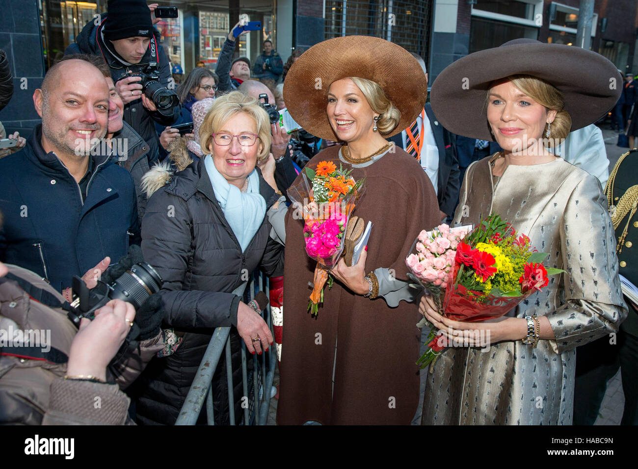 Queen Mathilde of Belgium and Queen Maxima of The Netherlands with well wishers during their visit to the Flemish culture house de Brakke Grond in Amsterdam, The Netherlands, 28 November 2016. Directer Mieke Renders guide the royal couples through the photo exhibition named Euregio-Maas-Rijn and writer Patrick Corillon introduce the show La Maison Vague to their majesties. The King and Queen of Belgium bring a 3 day state visit to the Netherlands. Photo: Patrick van Katwijk NETHERLANDS OUT POINT DE VUE OUT   - NO WIRE SERVICE - Photo: Patrick van Katwijk/Dutch Photo Press/dpa Stock Photo