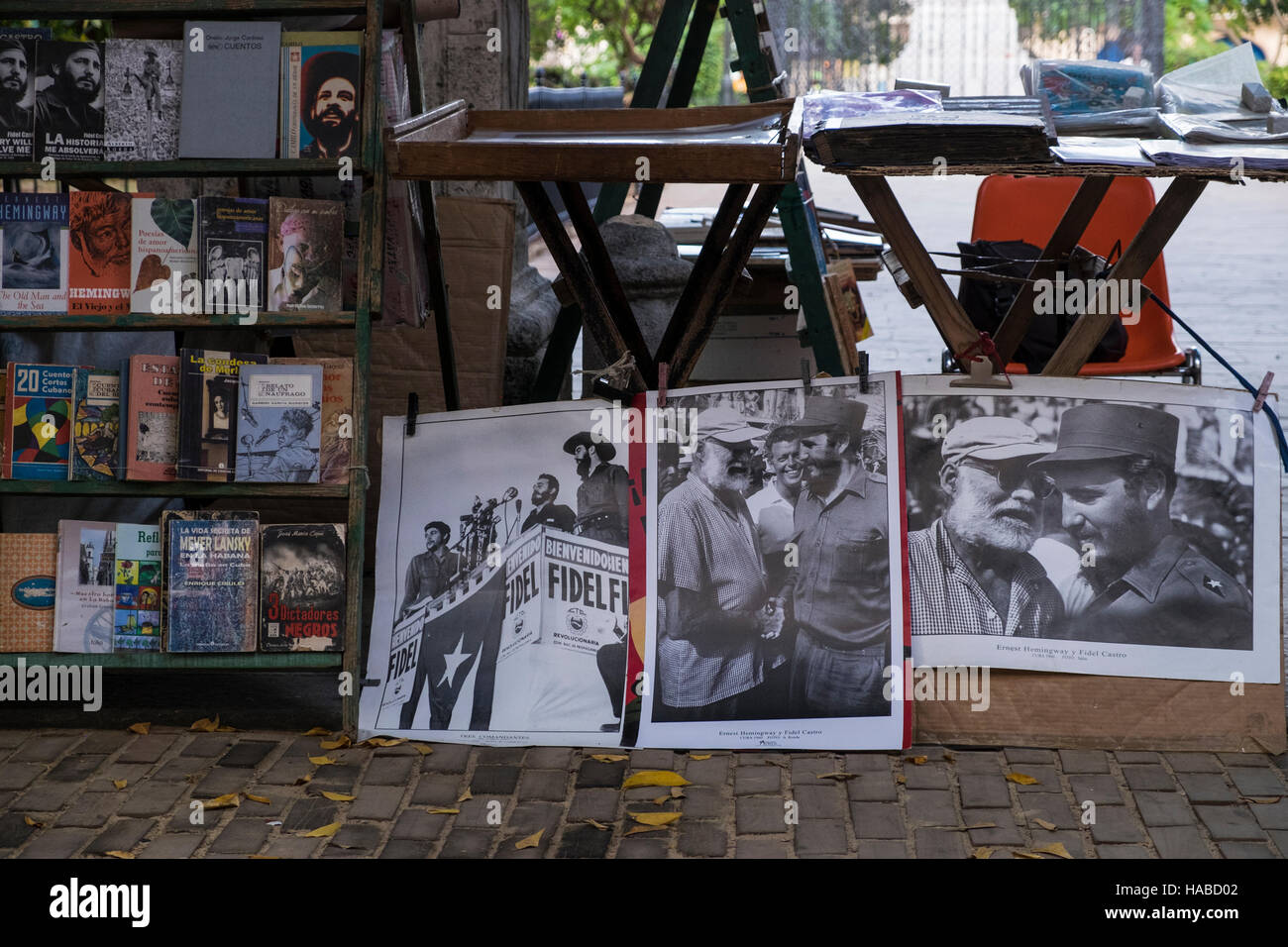 La Havana, Cuba, 26 November 2016. Scenes around the old town of La Havana on the day Castros death was announced. Old photos of Fidel Castro with Ernest Hemmingway at a stall in the Plaza Armas. Stock Photo