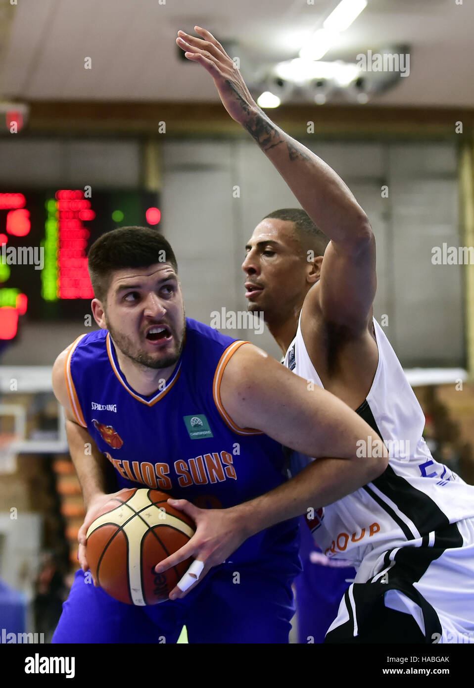 Nymburk, Czech Republic. 29th Nov, 2016. From left: Tomaz Bolcina of  Domzale and Diamon Simpson of Nymburk in action during the men's Basketball  Champions League 7th round game, Group A: CEZ Nymburk