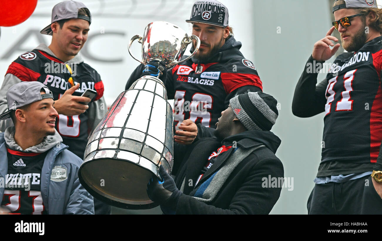 Ottawa, Canada. 29th Nov, 2016. The Ottawa Redblacks enjoy the Grey Cup during Parade at Lansdowne Park.  The team, in only their 3rd season, won the city’s first CFL championship in 40 years, with an upset win over the Calgary Stampeders. Credit:  Paul McKinnon/Alamy Live News Stock Photo