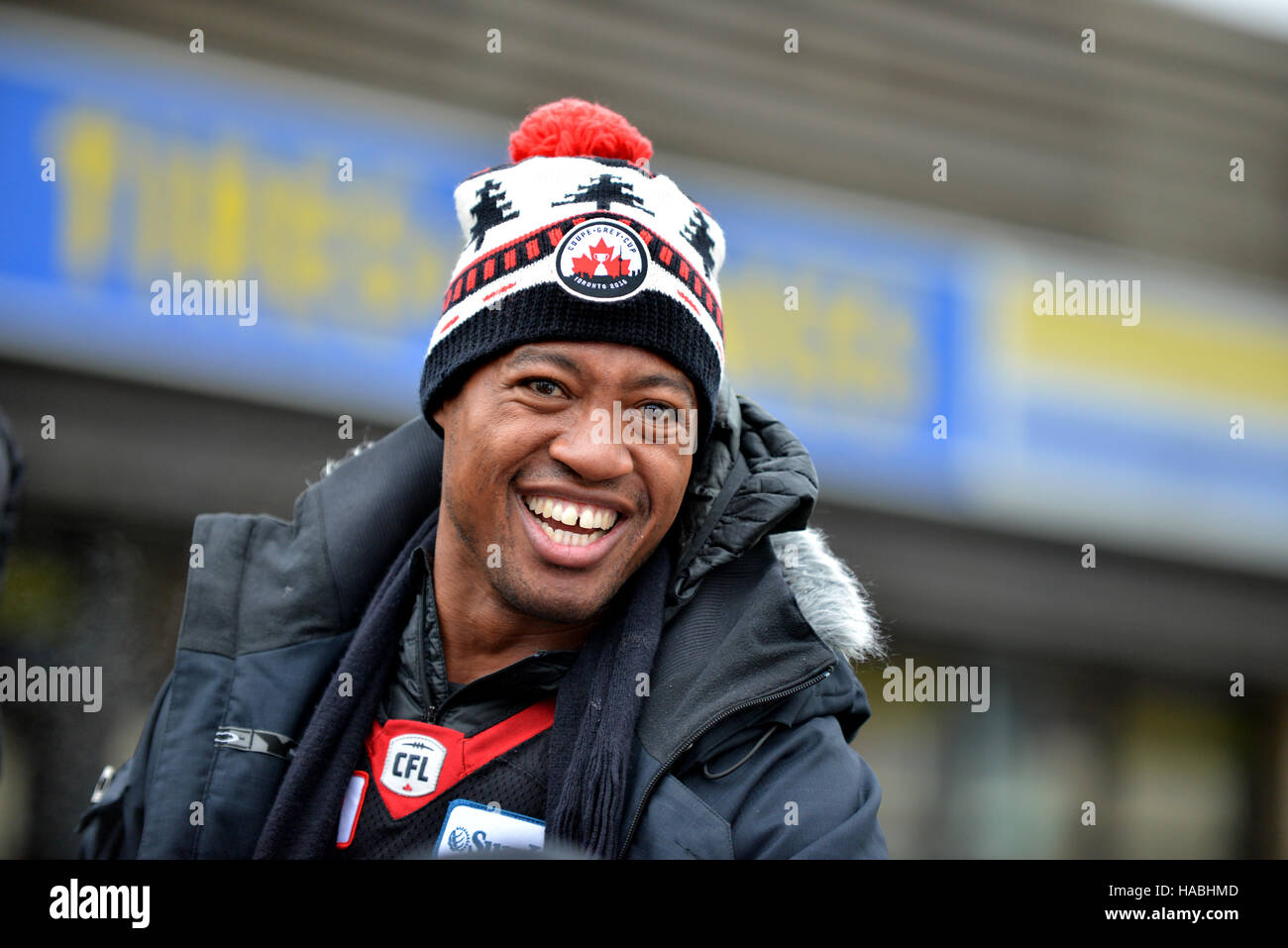 Ottawa, Canada. 29th Nov, 2016. MVP Henry Burris during the Grey Cup Parade on Bank Street.  The 41 year old Quarterback led the Ottawa Redblacks, in only their 3rd season to the city’s first CFL championship in 40 years, with an upset win over the Calgary Stampeders. Credit:  Paul McKinnon/Alamy Live News Stock Photo