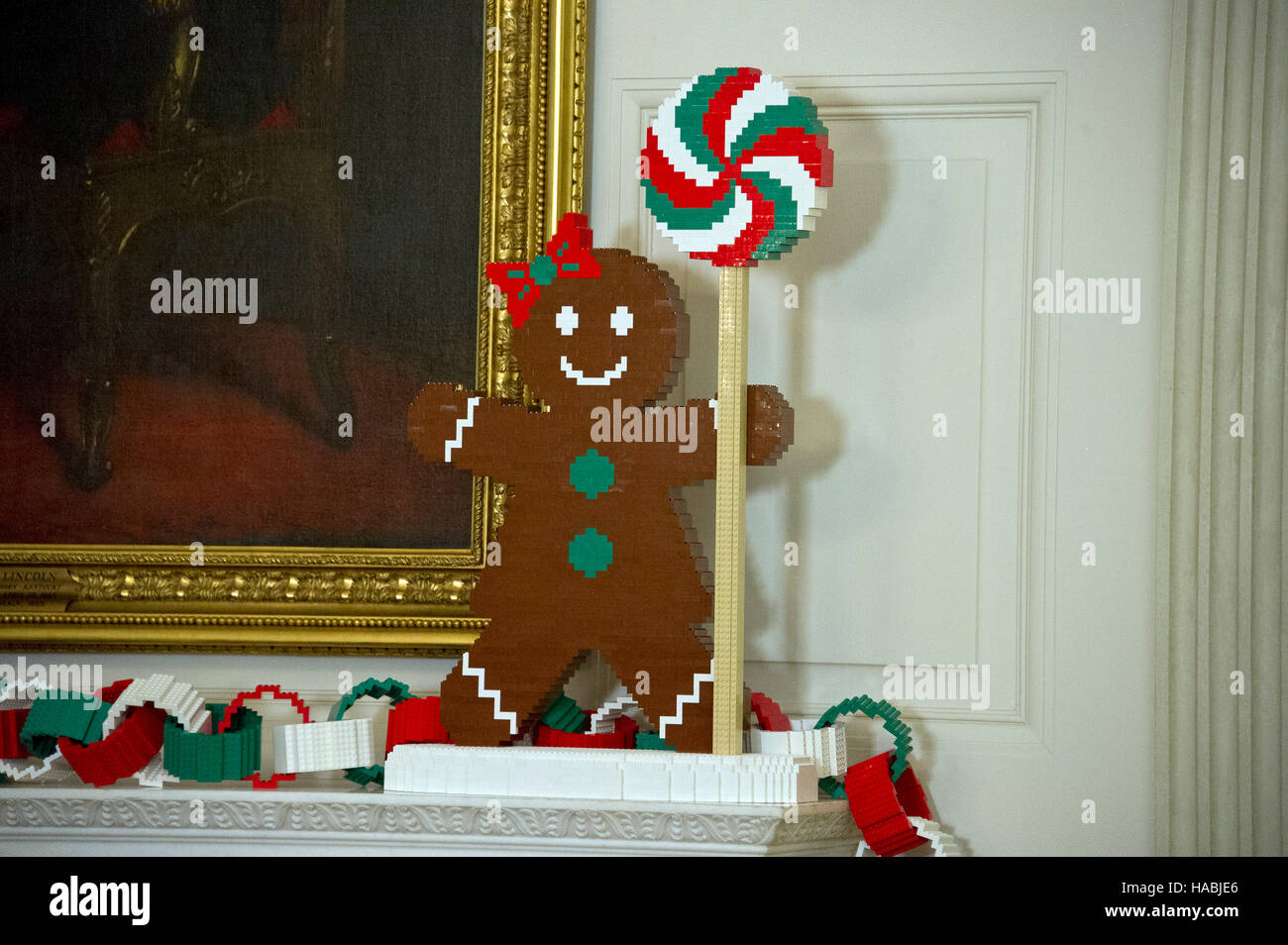 The 2016 White House Christmas decorations are previewed for the press at the White House in Washington, DC on Tuesday, November 29, 2016. On the mantle, a first-of-its-kind LEGO paper chain measuring approximately 18 feet long will hang alongside LEGO “gingerfriends”, built from 4,900 LEGO bricks. The first lady's office released the following statement to describe those decorations, 'This year's holiday theme, 'The Gift of the Holidays, ' reflects on not only the joy of giving and receiving, but also the true gifts of life, such as service, friends and family, education, and good health, as  Stock Photo