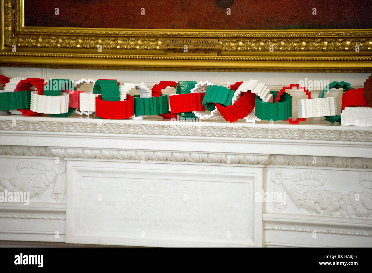 The 2016 White House Christmas decorations are previewed for the press at the White House in Washington, DC on Tuesday, November 29, 2016. On the mantle, a first-of-its-kind LEGO paper chain measuring approximately 18 feet long will hang alongside LEGO “gingerfriends”, built from 4,900 LEGO bricks. The first lady's office released the following statement to describe those decorations, 'This year's holiday theme, 'The Gift of the Holidays, ' reflects on not only the joy of giving and receiving, but also the true gifts of life, such as service, friends and family, education, and good health, as  Stock Photo