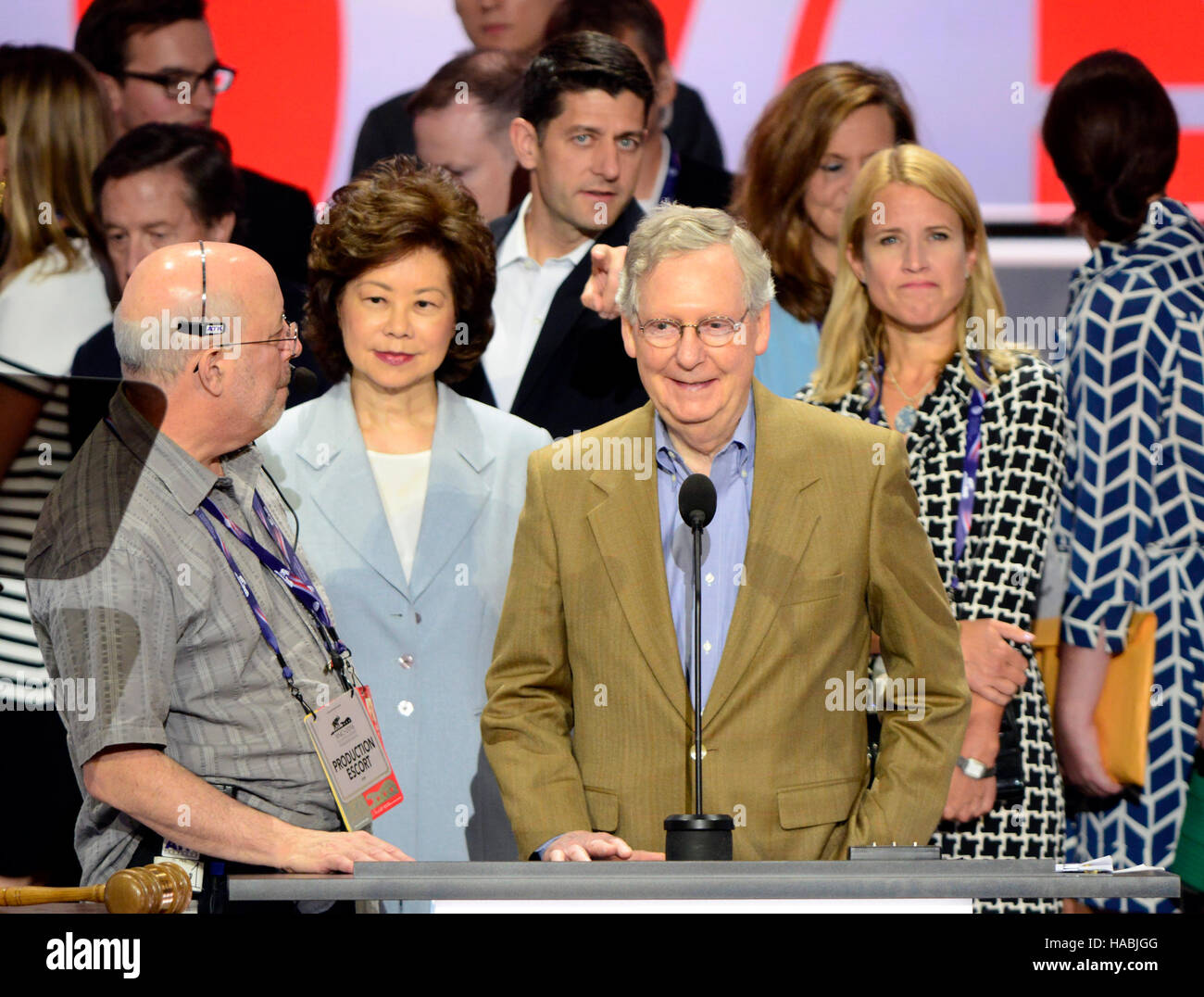 United States Senate Majority Leader Mitch McConnell (Republican of Kentucky) and his wife, Elaine Chao participate in a rehearsal prior to the 2016 Republican National Convention in Cleveland, Ohio on Sunday, July 17, 2016. Standing behind them and pointing is US Speaker of the House Paul Ryan (Republican of Wisconsin) and his wife Janna. Credit: Ron Sachs/CNP (RESTRICTION: NO New York or New Jersey Newspapers or newspapers within a 75 mile radius of New York City) /MediaPunch /MediaPunch Stock Photo
