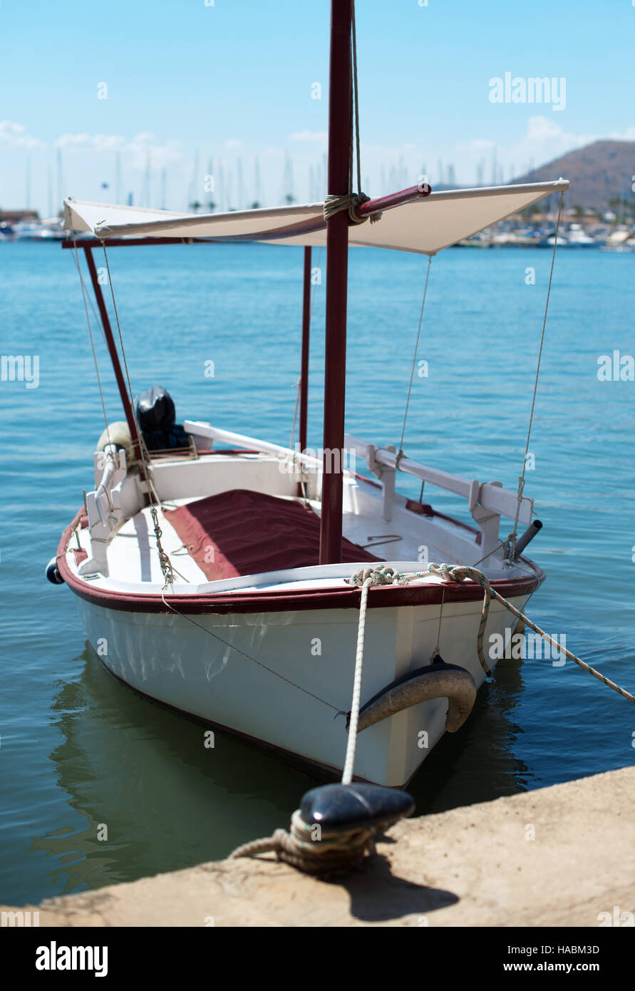 Wooden boat moored at the dock Stock Photo - Alamy