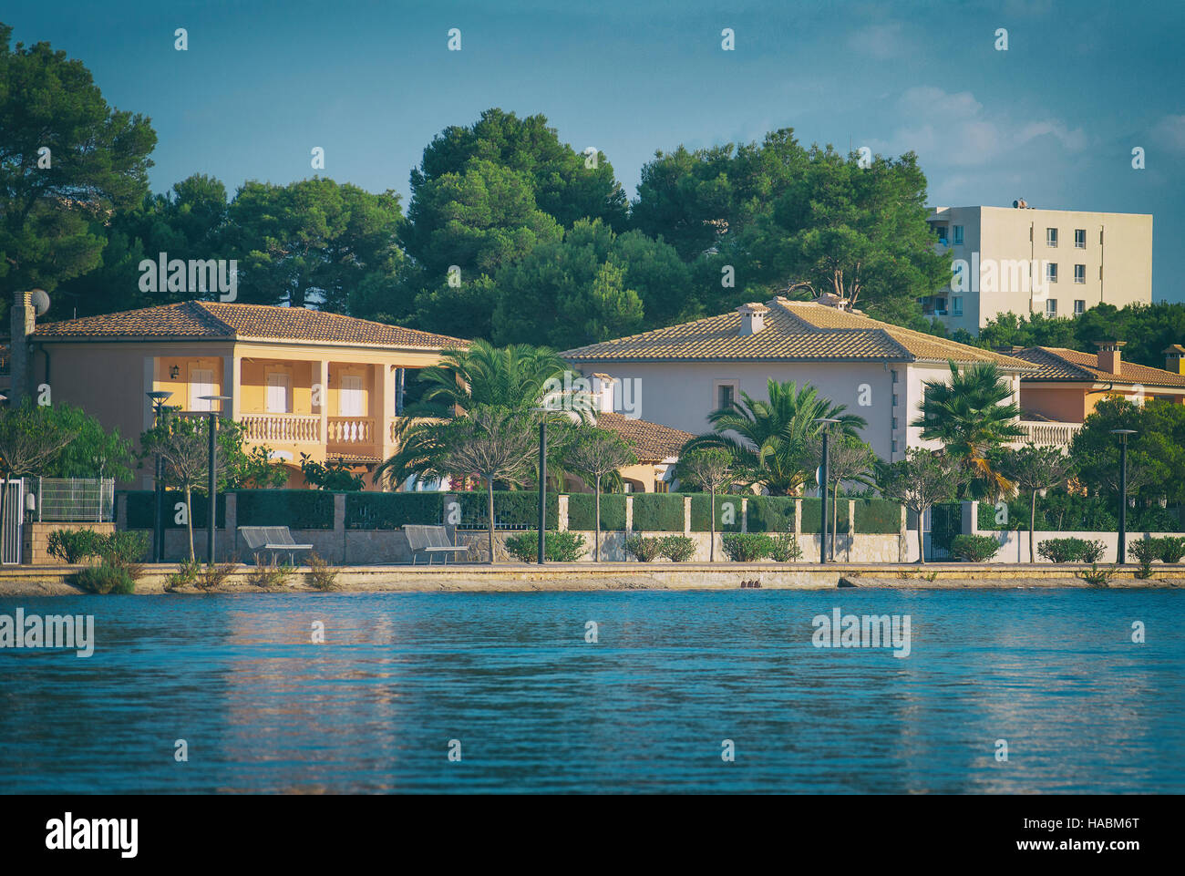 Several houses near pond. Alcudia, Mallorca Stock Photo Alamy