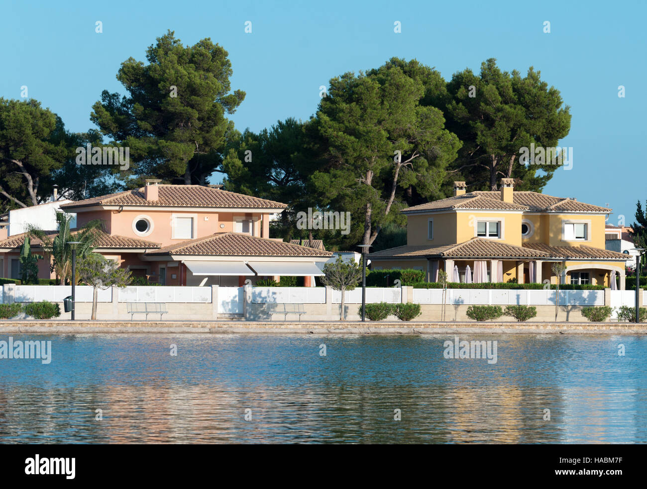 Several houses near pond. Alcudia, Mallorca Stock Photo Alamy