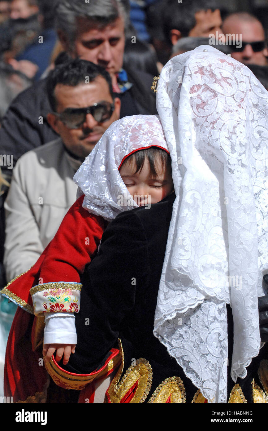 Sardinian girls wearing traditional dress at the Sartiglia parade