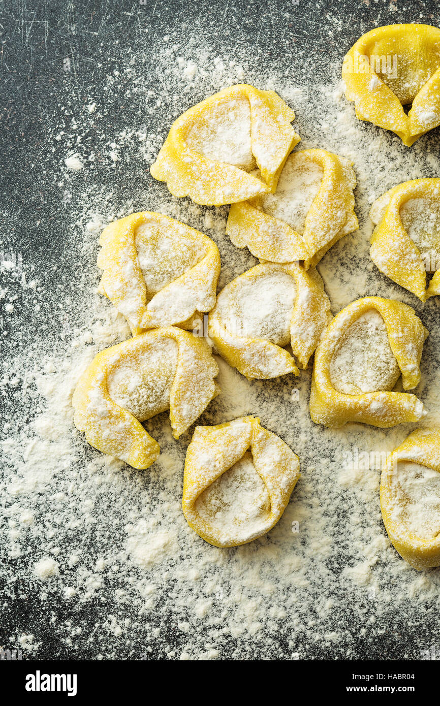 Italian traditional tortellini pasta and white flour Stock Photo Alamy